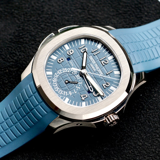 Patek Philippe NEW 2025 Aquanaut 5164G-001 “LIGHT BLUE AQUA” Light Blue Dial White Gold Travel Time Tropical Strap 40.8mm