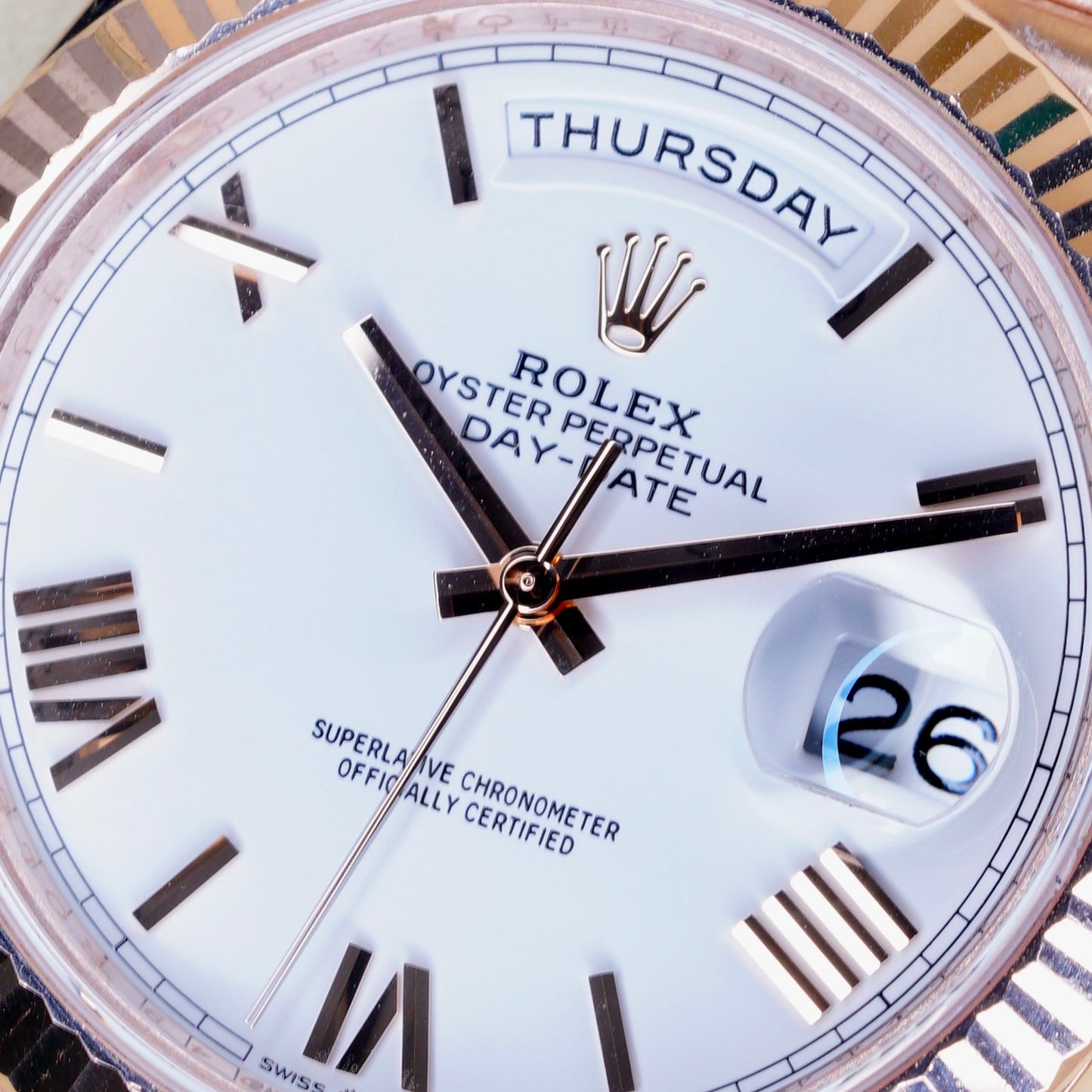 Rolex Day-Date 228235 White Roman Dial Rose Gold 40mm