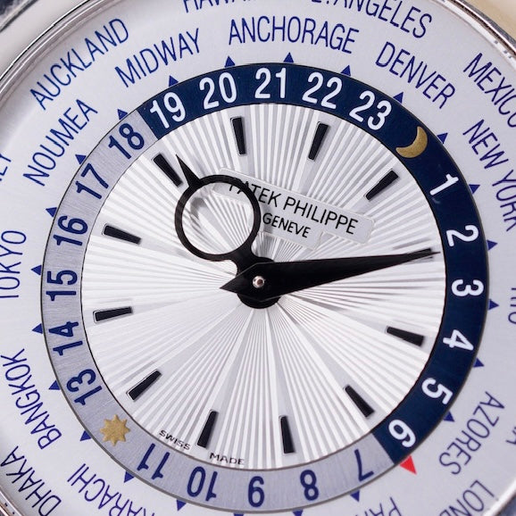 Patek Philippe 5130G-019 “WORLD TIME” White Dial Blue Accents White Gold Blue Leather Strap 39mm 2014