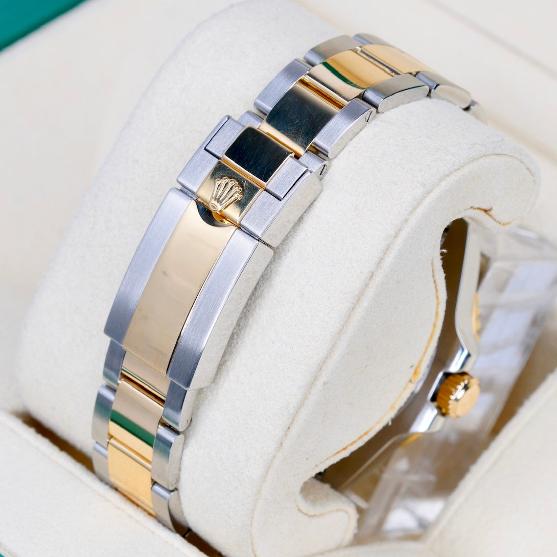 Rolex GMT-Master II 116713LN Black Dial Green Arrow Two-Tone Yellow Gold & Steel 40mm