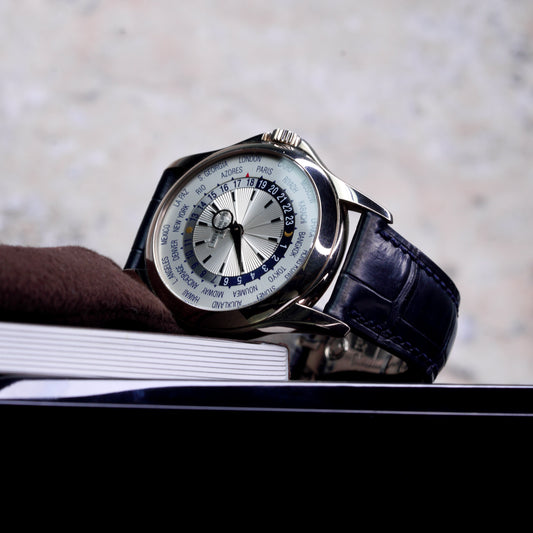 Patek Philippe 5130G-019 “WORLD TIME” White Dial Blue Accents White Gold Blue Leather Strap 39mm 2014