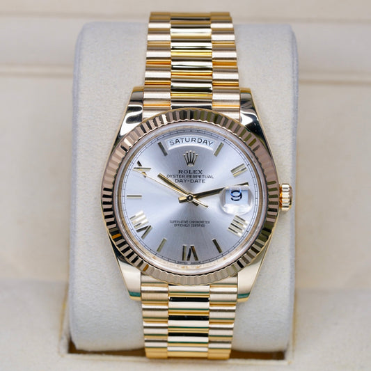 Rolex Day-Date 228238 Silver Roman Dial Yellow Gold Presidente 40mm