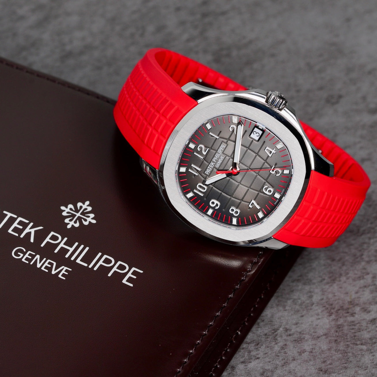 Patek Philippe Aquanaut 5167A-012 “SINGAPORE” Black Dial Red Accents Red Tropical Strap Limited Edition