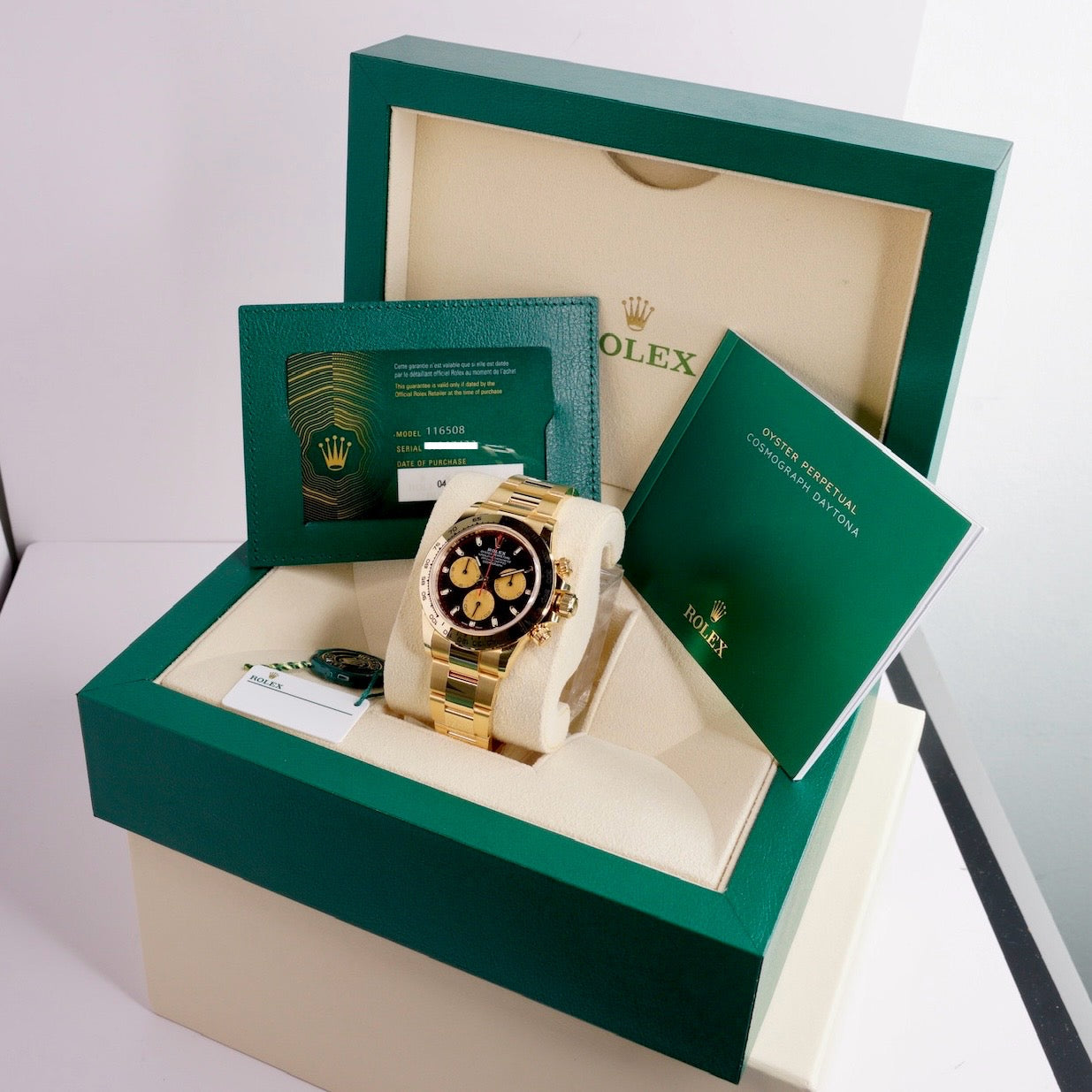 Rolex NEW OLD STOCK Daytona 116508 “PAUL NEWMAN” Black Dial Red Accents Champagne Subdials Yellow Gold 40mm 2023