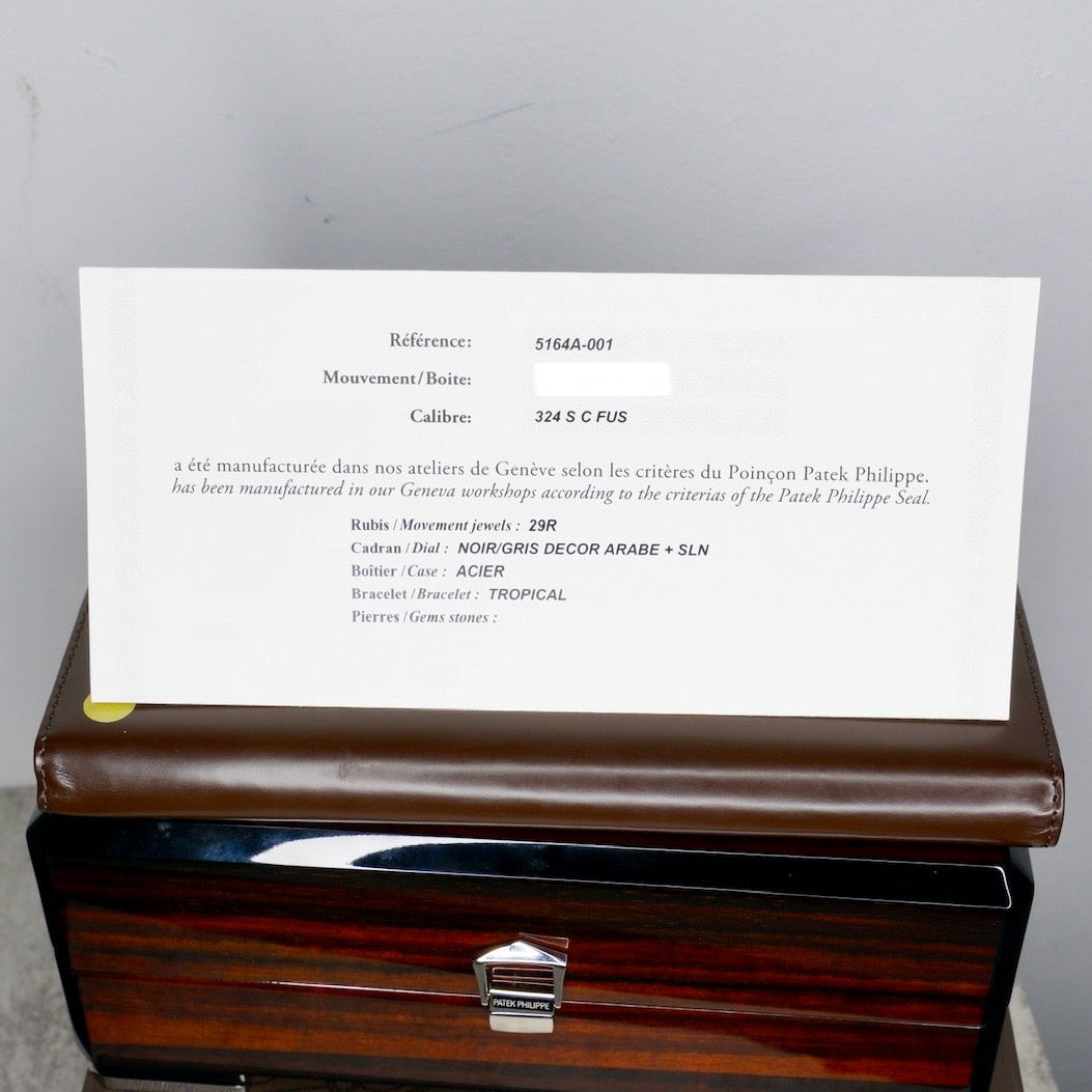 Patek Philippe Aquanaut 5164A-001 “BLACK TRAVEL TIME” Black Smoked Dial Stainless Steel Tropical Strap 40.8mm 2020